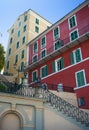 Yellow and red buildings in Bastia in Corsica with a blue sky Royalty Free Stock Photo