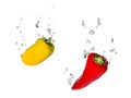Yellow and red capsicum in water with air bubbles Royalty Free Stock Photo