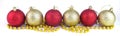 Yellow and red Christmas balls in a row long banner. Royalty Free Stock Photo