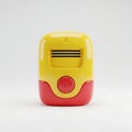 Yellow and red device with test button and vents on white background Royalty Free Stock Photo
