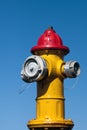 Yellow and red fire hydrant Royalty Free Stock Photo