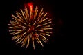 Yellow and red fireworks in the shape sphere Royalty Free Stock Photo