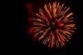 Yellow and red fireworks in the shape sphere Royalty Free Stock Photo