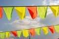 Yellow and red flags. Blue sky background. Royalty Free Stock Photo