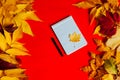 Yellow and red leaves autumn background notepad notes postcard Royalty Free Stock Photo