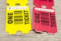 Yellow and red paper tickets