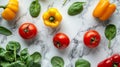 Yellow and Red Peppers, Tomatoes, and Spinach on Marble Royalty Free Stock Photo