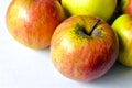 Yellow red ripe apples on a white background Royalty Free Stock Photo