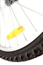 Yellow reflector on bike wheel