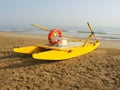 Yellow rescue boat on Italian beach. Adriatic sea. Emilia Romagna. Italy Royalty Free Stock Photo