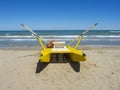 Yellow rescue boat on Italian beach. Adriatic sea. Emilia Romagna. Italy Royalty Free Stock Photo