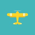 Yellow retro airplane or aeroplane. Flat old vintage aircraft isolated on blue background Royalty Free Stock Photo