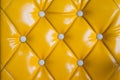 Yellow retro chesterfield style, capitone textile background