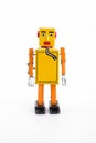 Yellow retro toy robot. Royalty Free Stock Photo
