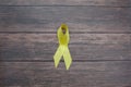 Yellow ribbon symbolic color for Sarcoma Bone cancer, Bladder cancer, Liver disease, Spina Bifida Awareness Royalty Free Stock Photo