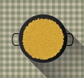 Yellow rice in paella pan