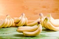 Yellow ripe bananas on a green chalkboard on the background of y