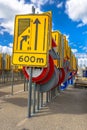 Yellow road narrowing sign