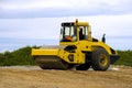 Yellow road roller at work Royalty Free Stock Photo