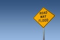 Road May Flood Sign Against A Clear Blue Sky