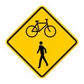 Yellow road sign for pedestrians and cyclists Royalty Free Stock Photo