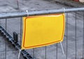 Yellow road sign on the road. Renovation work sign. Caution symbol under construction, road works in progress sign Royalty Free Stock Photo