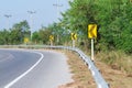 Yellow road signs warn Drivers for Ahead Dangerous Curve Royalty Free Stock Photo