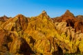 Yellow rock castle shaped mountains and rock formation valley Royalty Free Stock Photo