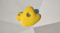 Yellow rock climbing wall hook