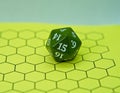 Yellow role-playing board with green dice