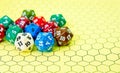 Yellow role-playing board with several colored dice