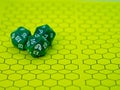 Yellow role-playing board with three green dice