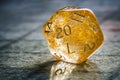 Yellow role playing game twenty sided dice close-up. Board game and rpg concept with copy space