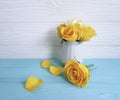 Yellow rose vase wooden background greeting decoration