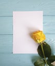 yellow roses beauty vintage on a blue wooden background place for text blank white card