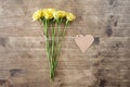 Yellow roses with heart shaped tag Royalty Free Stock Photo