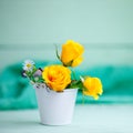 Yellow roses on a wooden table. Autumn background . Autumn still-life.