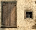 Yellow rough wall and windows Royalty Free Stock Photo