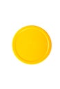 yellow round cap isolated on white background. Top view of yellow plastic lid Royalty Free Stock Photo