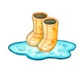 Yellow rubber boots in puddle of water on white Royalty Free Stock Photo