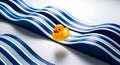 Yellow rubber duck on abstract blue waves background Royalty Free Stock Photo