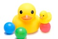 Yellow rubber duck with colorful ball