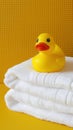 Yellow Rubber Duck on Stack of White Towels Royalty Free Stock Photo