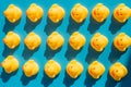 Yellow rubber ducks on a blue background with hard shadows Royalty Free Stock Photo