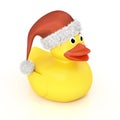 Yellow rubber ducky with a christmas hat Royalty Free Stock Photo