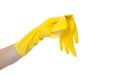 Yellow rubber gloves for cleaning on white background, workhouse concept