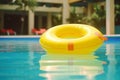 Yellow rubber ring in pool on tropical resort. Generative AI