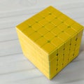Yellow Rubik\'s cube known as professors cubes Royalty Free Stock Photo