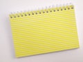 Yellow ruled flip note book 2 Royalty Free Stock Photo