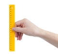 Yellow ruller in hands measure isolated Royalty Free Stock Photo